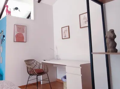 a room with a desk and a chair at casa de vicky in El Puerto de Santa María