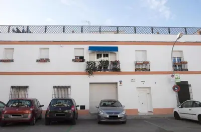 a group of cars parked in front of a building at Miriam Costa de la luz 2 in Jerez de la Frontera