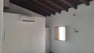 a white room with a window and a white wall at Apartamento la Buganvilla in Jerez de la Frontera
