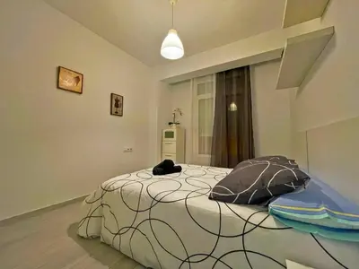 a room with a bed in a room at La Torre de la Catedral - Ole Solutions in Jerez de la Frontera