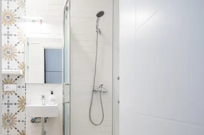 a bathroom with a shower and a sink at El Balcon de la Viña by Cadiz Time in Cádiz