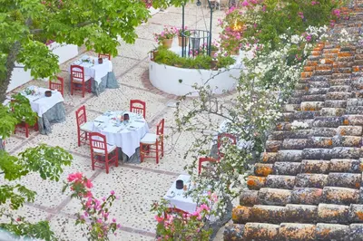 an overhead view of a restaurant with tables and chairs at Hacienda de San Rafael in Las Cabezas de San Juan