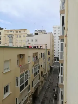 a view of a city street from an apartment building at Keka en Playa la Victoria con Ascensor Grupo AC Gestion in Cádiz