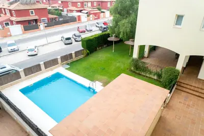 a view of a swimming pool from a balcony of a building at R&B Vistahermosa Views in El Puerto de Santa María
