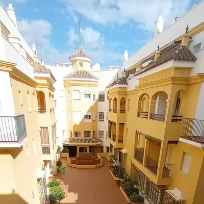 a view of the courtyard of a building at Apto MANAMAR - Entre centro y playa - Parking privado gratis in Sanlúcar de Barrameda