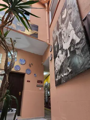 a painting on the side of a building at Hotel Nova Centro in Jerez de la Frontera