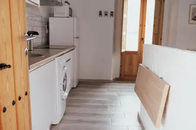 a kitchen with a sink and a dishwasher at APARTAMENTO EL NANO in Jerez de la Frontera