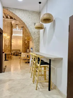 a dining room with a table and chairs at Soho Boutique Cádiz in Cádiz