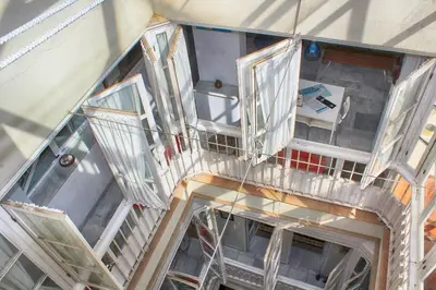 an overhead view of a staircase in a building at PENTHOUSE WITH LARGE TERRACE IN CENTER OF CÁDIZ in Cádiz