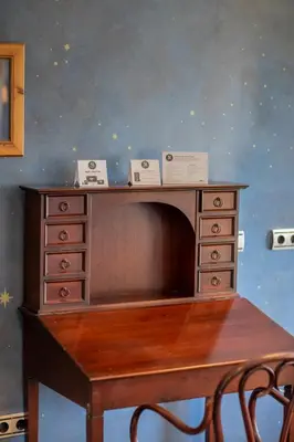 a wooden desk with a table with a drawer at Soho Boutique Vistahermosa in El Puerto de Santa María