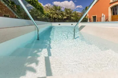 a swimming pool with water coming out of it at Soho Boutique Jerez in Jerez de la Frontera