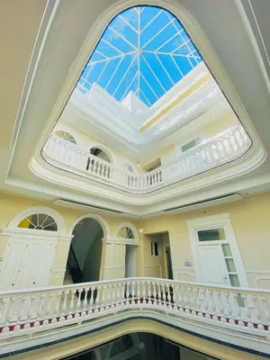 a building with a domed ceiling with a skylight at Hotel Boutique Las Cortes De Cádiz in Cádiz