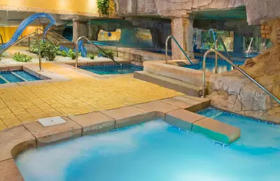 a large pool of blue water in a water park at Senator Cádiz in Cádiz