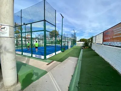 a tennis court with people on the court at MyChoice Soleá in Rota