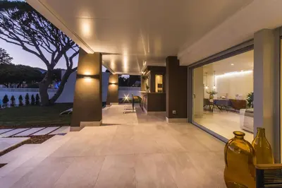 a hallway of a house with a view of a yard at SIAT VIVIENDAS Villa carretera LA BARROSA in Chiclana de la Frontera