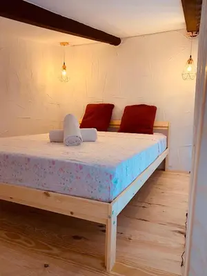 a bedroom with a bed in a room at Suite San Mateos 15 in Jerez de la Frontera
