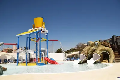 a water park with an elephant in the water at Playaballena in Costa Ballena