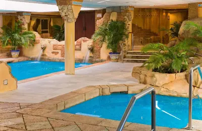a pool in a resort with a water park at Playaballena in Costa Ballena
