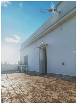 a building with a drone on top of it at Ático en pleno centro de Jerez sin ascensor in Jerez de la Frontera