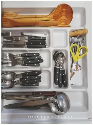 a drawer full of utensils in a refrigerator at Ático en pleno centro de Jerez sin ascensor in Jerez de la Frontera