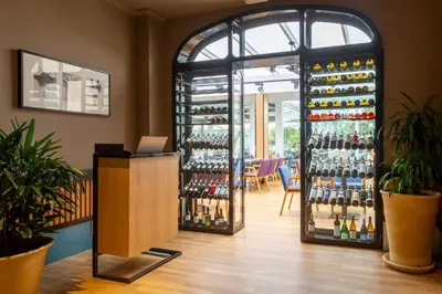a room with a bunch of bottles of wine at Barceló Montecastillo Golf in Jerez de la Frontera
