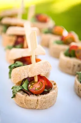 a group of sandwiches with wooden sticks in them at Barceló Montecastillo Golf in Jerez de la Frontera