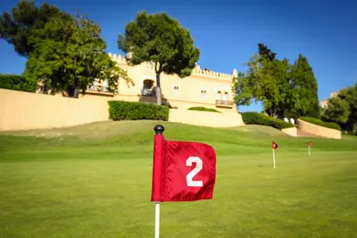 a red flag with the number two on a golf course at Barceló Montecastillo Golf in Jerez de la Frontera