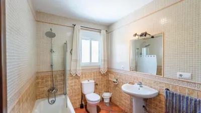 a bathroom with a sink and a toilet and a shower at Chalet Algar by Ruralidays in Algar