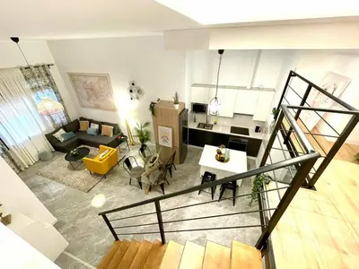 an overhead view of a living room with a couch at Apartamento Cádiz Costa in Cádiz