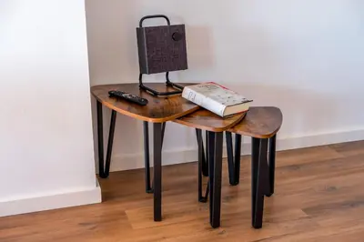 a table with a lamp and a book on it at Penthouse with Jacuzzi, and garaje Grupo AC Gestion in Cádiz