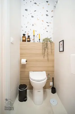a bathroom with a white toilet in a room at Apartamento Sanlúcar Sunset in Sanlúcar de Barrameda