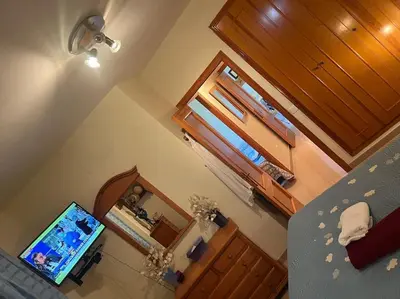 an overhead view of a living room with a tv and a room with at Apartamento en Costa Ballena, Urb. Playa Ballena in Cádiz