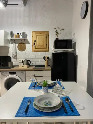 a kitchen with a table with a plate on it at Apartamento Jerez Sherry in Jerez de la Frontera