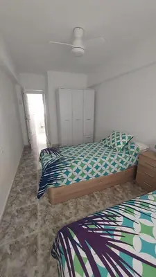 a bedroom with two beds in a room at PISABEL in Sanlúcar de Barrameda