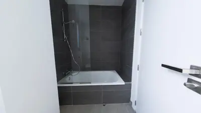 a bathroom with a bath tub and a shower at Viento Grande, Apartamento boutique en la playa in Rota