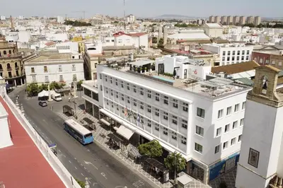 an overhead view of a city with a white building at esZentrico Suites Jerez in Jerez de la Frontera