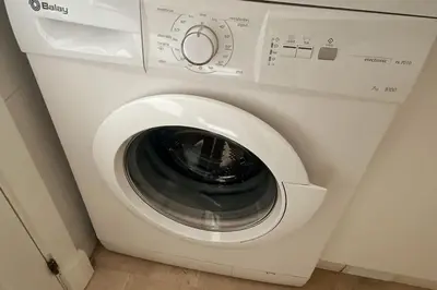 a white washing machine sitting in a room at Novo Sancti Petri, La Barrosa, 2 Beds Room Apartamento by Chiclana Dreams in Chiclana de la Frontera