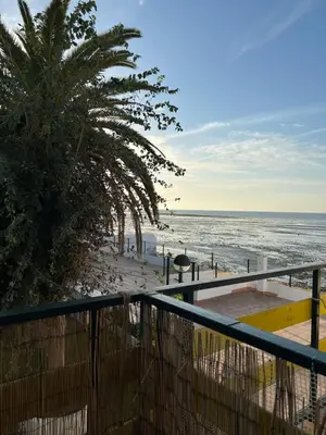 a view of the beach from the balcony of a condo at Precioso Apto con vistas al Parque Nacional Doñana in Chipiona
