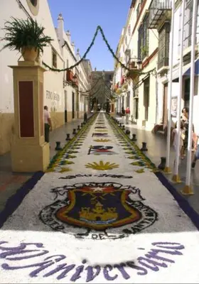 an empty street with tiles on the ground in a city at GATU La Joya Escondida in El Puerto de Santa María