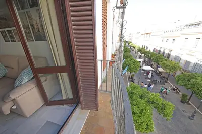 a balcony of a building with a view of a street at Allo Apartments Larga Hideaway Parking Centro 2 Habitaciones in Jerez de la Frontera