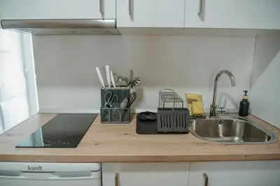a kitchen counter top with a sink and a sink at Olivar de Belén in Jerez de la Frontera