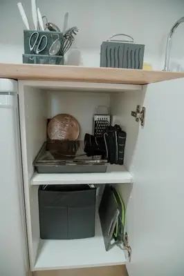 a kitchen pantry with a shelf with food on it at Olivar de Belén in Jerez de la Frontera