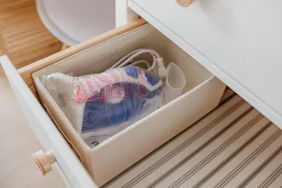 a drawer in a cabinet with shoes in it at Olivar de Belén in Jerez de la Frontera