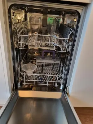 a dishwasher with dishes inside of it at AUJADA CENTRO in Cádiz