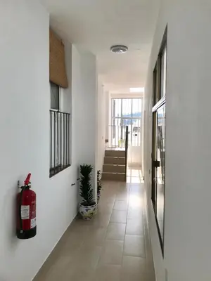 a hallway of a house with a fire extinguisher at El rincón de Manolita #3 in Bornos