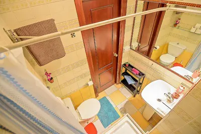 an overhead view of a hospital bathroom with a bed at Misericordia Central 4-Bedroom Apartment with Lift in El Puerto de Santa María