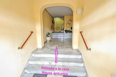 an image of a hallway with a house entrance at Misericordia Central 4-Bedroom Apartment with Lift in El Puerto de Santa María