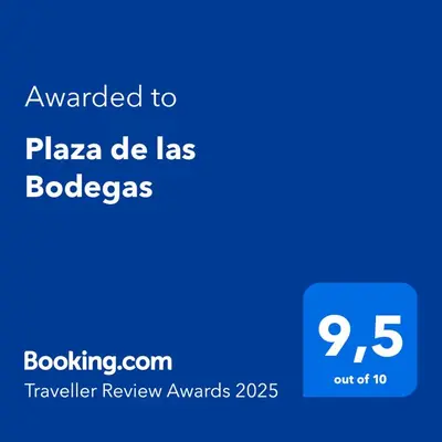 a screenshot of a cell phone with the text awarded to pizza de las lobos at Plaza de las Bodegas in El Puerto de Santa María