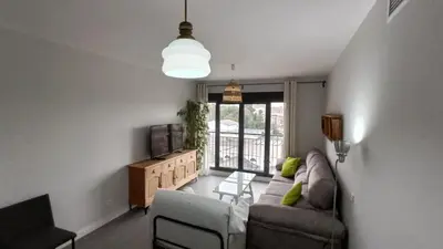 a living room with a couch and two chairs at Kiana Mirador Jerez con parking in Jerez de la Frontera