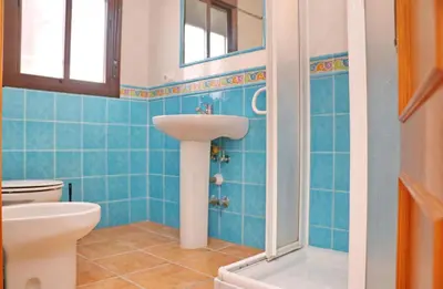 a bathroom with a sink and a toilet at Chalet Florida III in Conil de la Frontera